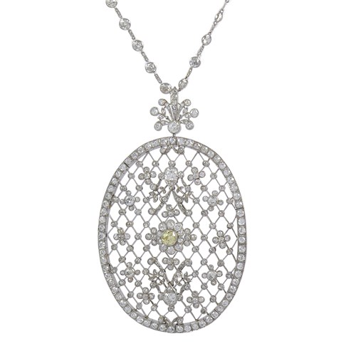 Large early 20th century diamond set articulated openwork oval brooch-pendant, c.1905, possibly French, featuring a knifebar lattice with central yellow diamond, of approximately 0.65ct, in white diamond flowerhead cluster,